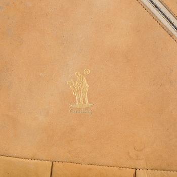 TWO POUFS, signed Camelbag. Second half of the 20th century.