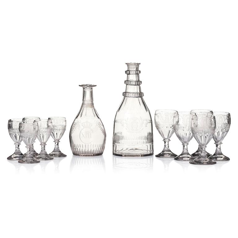 A 12 part glass service engraved by Anders Spolander, with the monogram of Carolus XIII, Reijmyre Sweden, 1810’s.