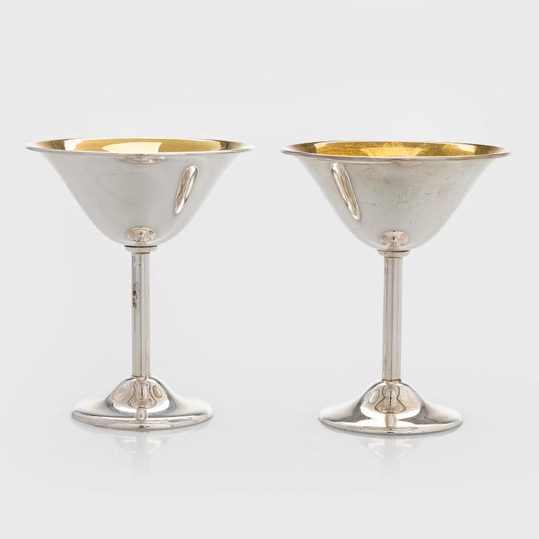 A 10-piece set of parcel-gilt silver beakers, Suomen Kultaseppä oy, Turku 1949.