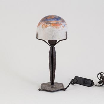 A French early 20th century Art Nouveau Daum table light from Nancy signed Daum Nancy France.