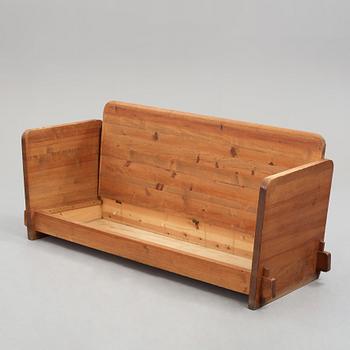 Axel Einar Hjorth, a stained pine "Lovö" sofa, Nordiska Kompaniet, Sweden 1930's.