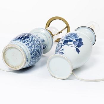 A set of two blue and white Chinese vases made in to lamps, late Qing dynasty, circa 1900.