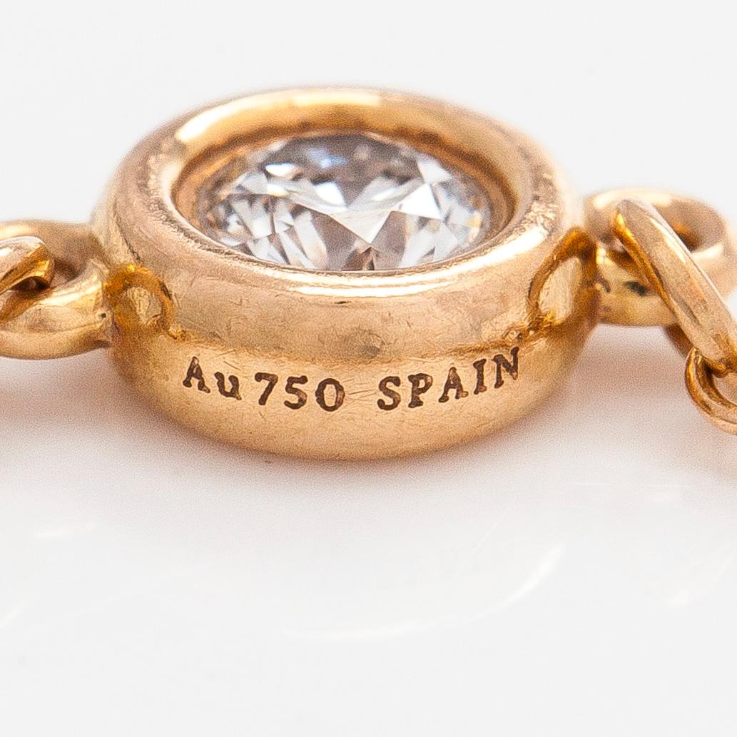 Tiffany & Co, Elsa Peretti, an 18K gold 'Diamonds by The Yard' ring with a brilliant-cut diamond.