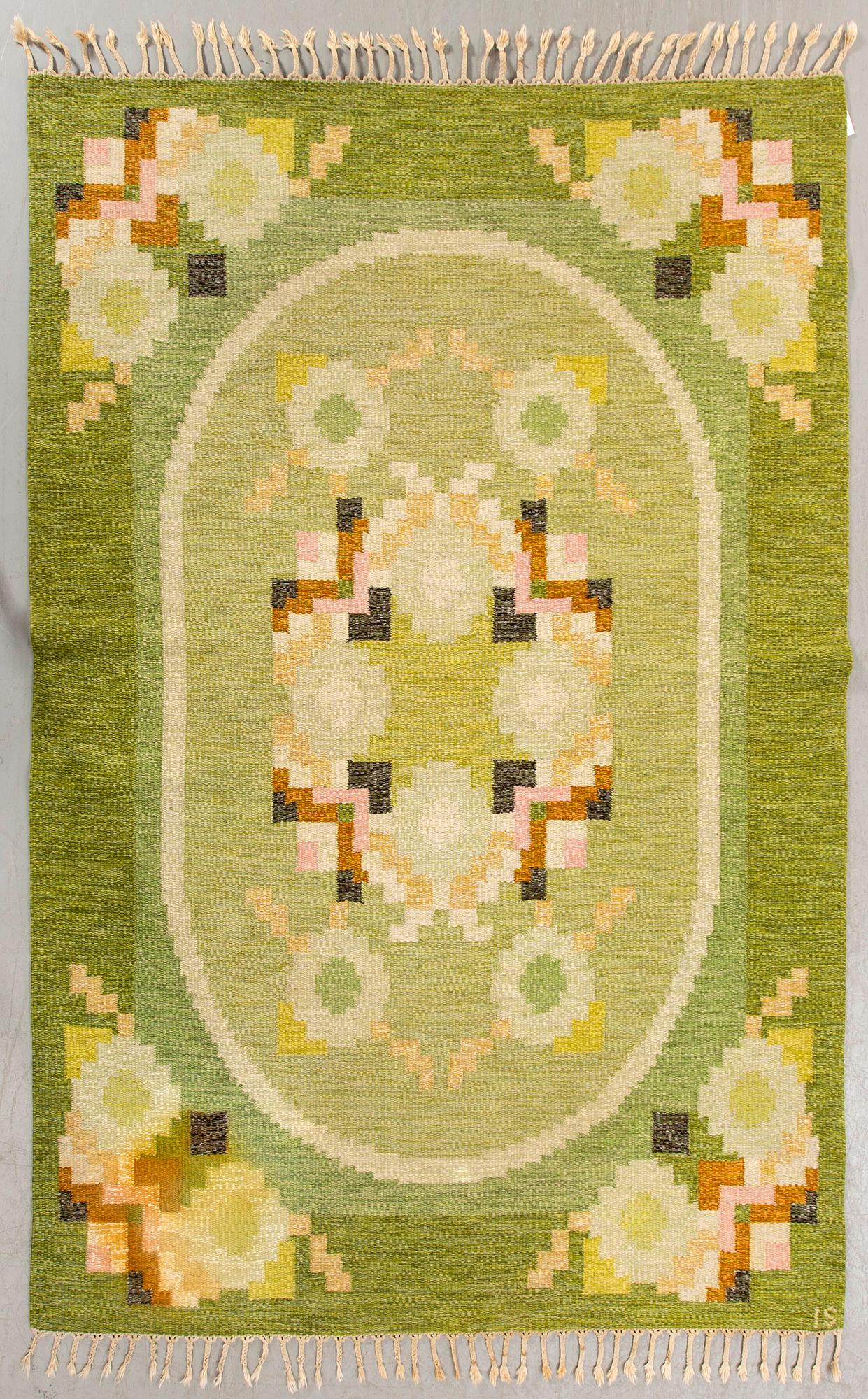 Ingegerd Silow, a singed flat weave carpet 233 x167 cm.