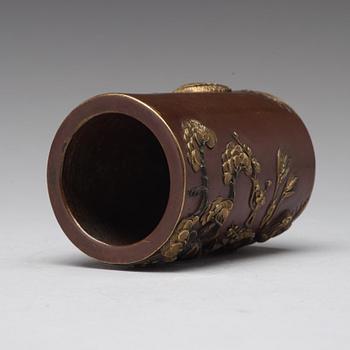 A bronze brush pot, Qing dynasty, with Qianlong seal mark to base.