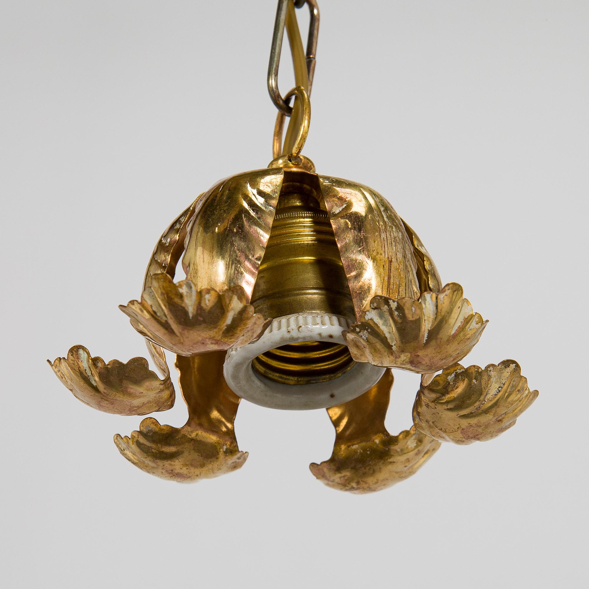 Kattovalaisin, 1900-luvun alku.