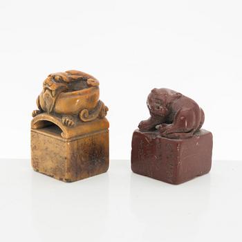 Two Chinese seals, in red and yellow stone.