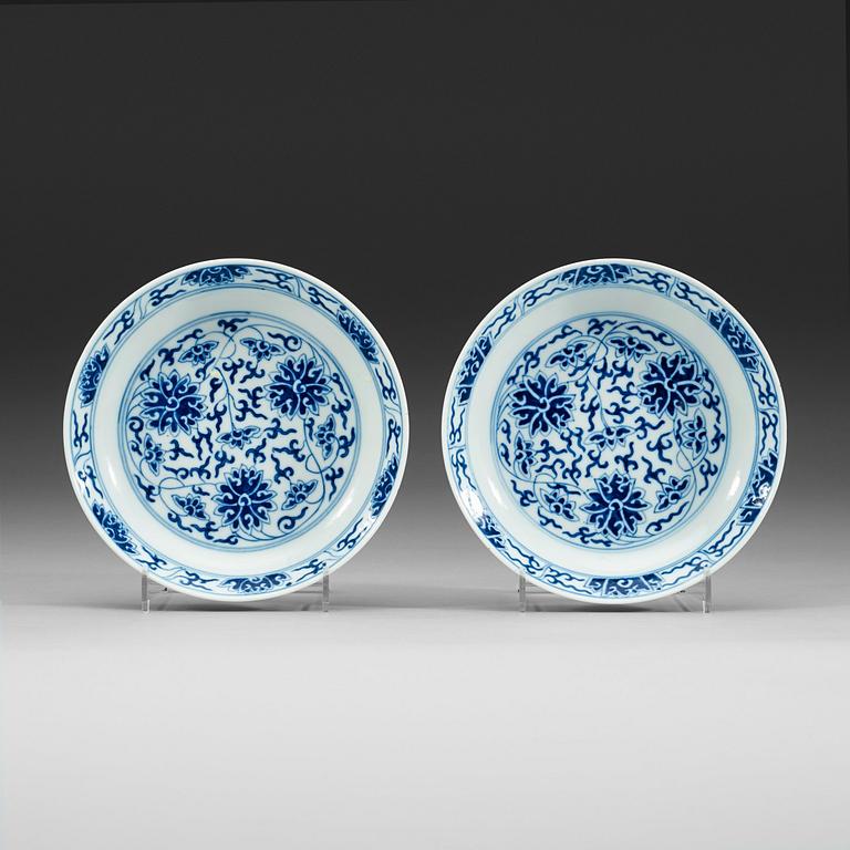 A pair of blue and white lotus dishes, Qing dynasty, Guangxu mark and period (1874-1908).