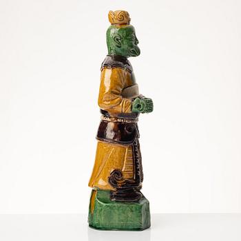 A stoneware figurine, China, Ming style but 20th century.