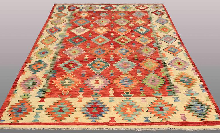 A carpet, KIlim, ca 296 x 197 cm.