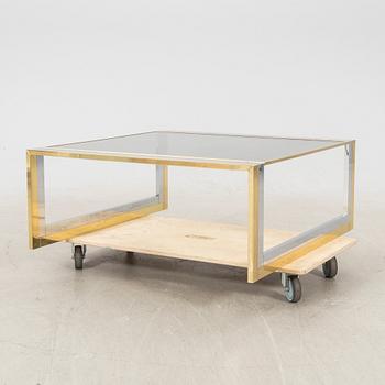 A glass and metal coffee table from Romeo Rega second half of the 20th century.
