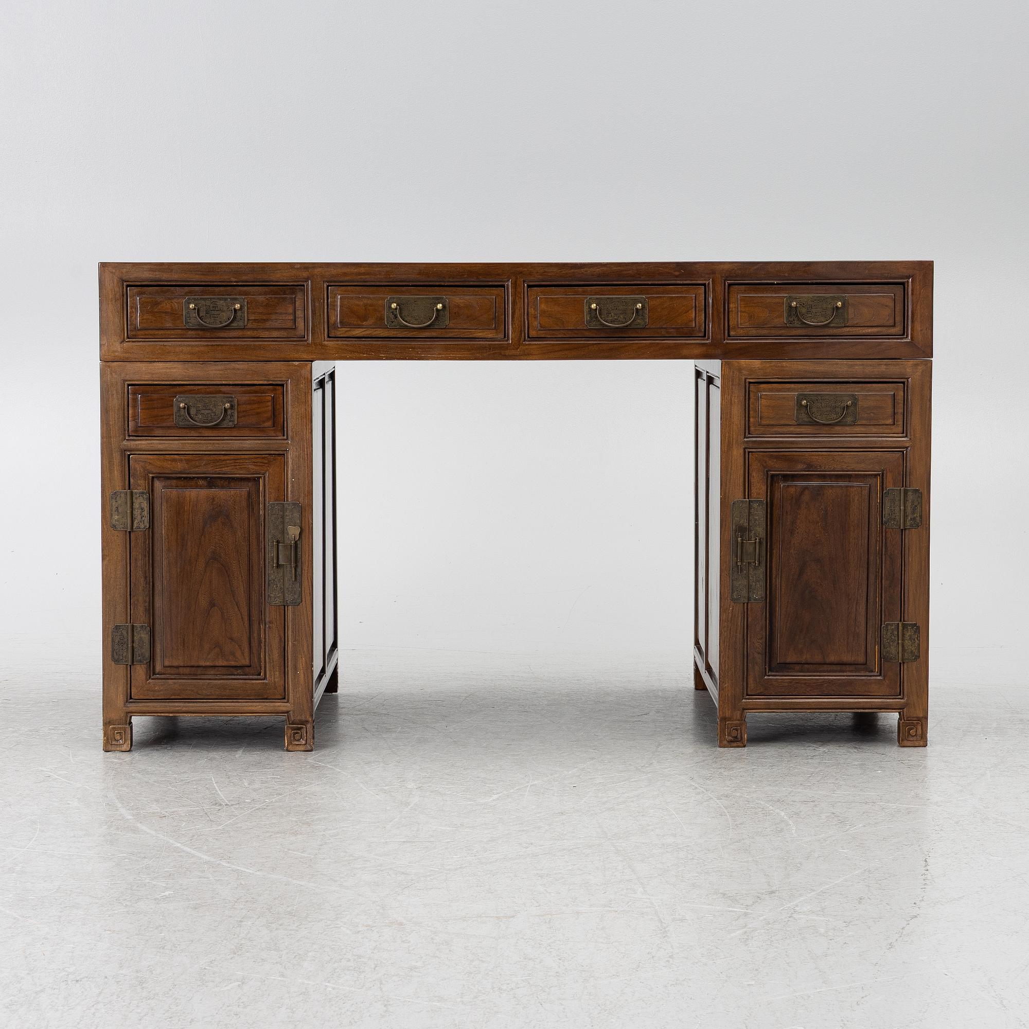 A Chinese hardwood desk, 20th century.