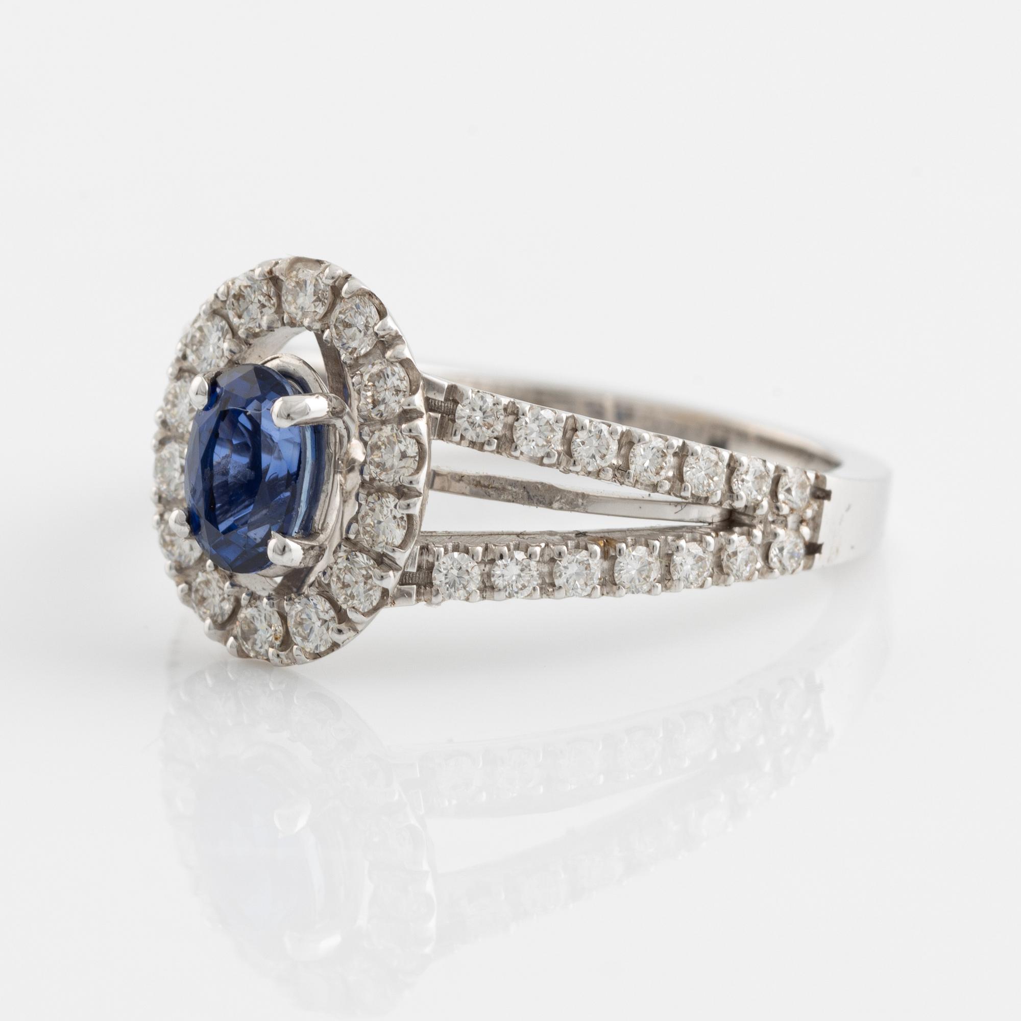 Oval sapphire and brilliant cut diamond ring.