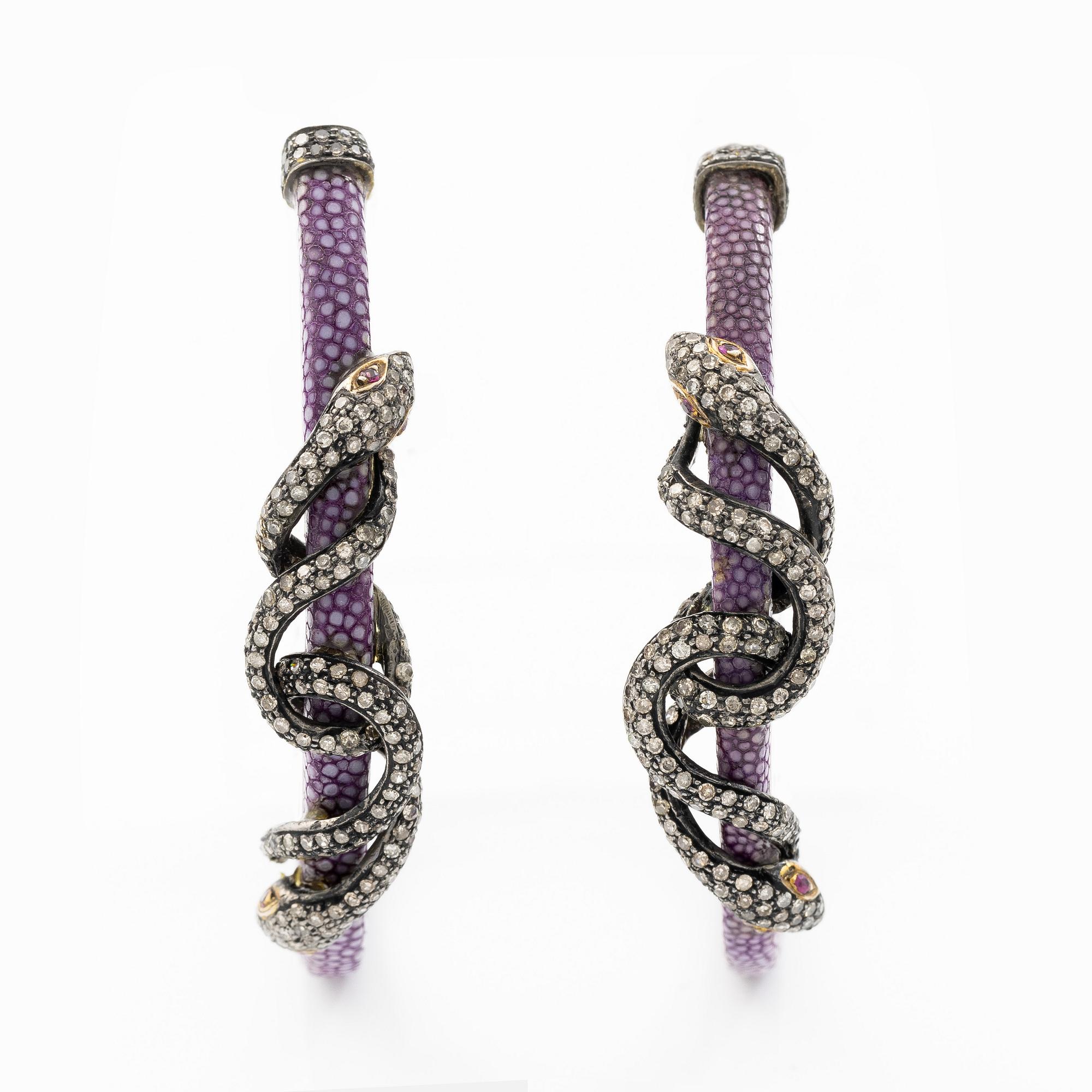 A pair of earrings in the shape of a snake, leather, mother-of-pearl and silver, with  diamonds in various cuts.