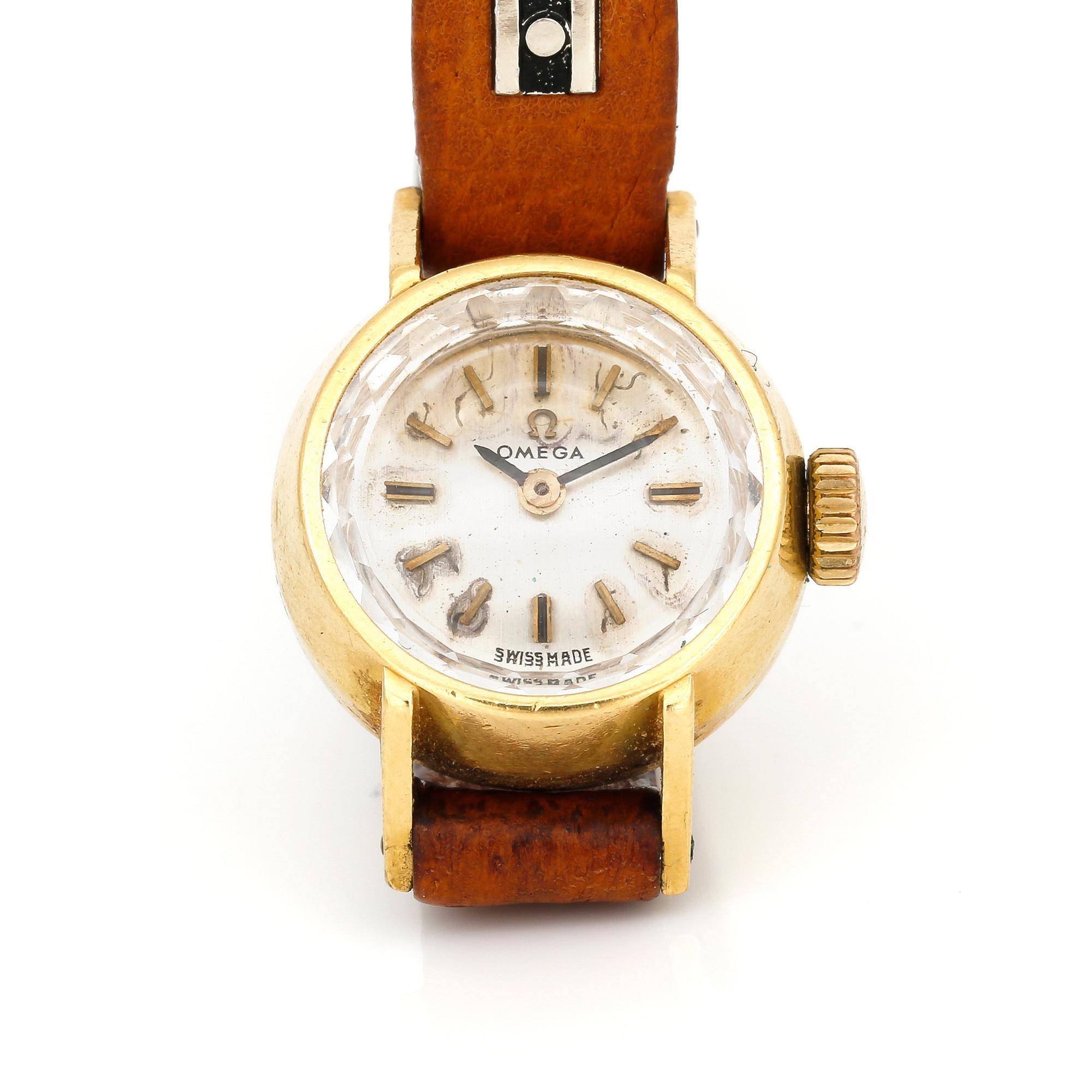ARMBANDSUR, minst 18K guld, Omega, 1900-talets andra hälft.