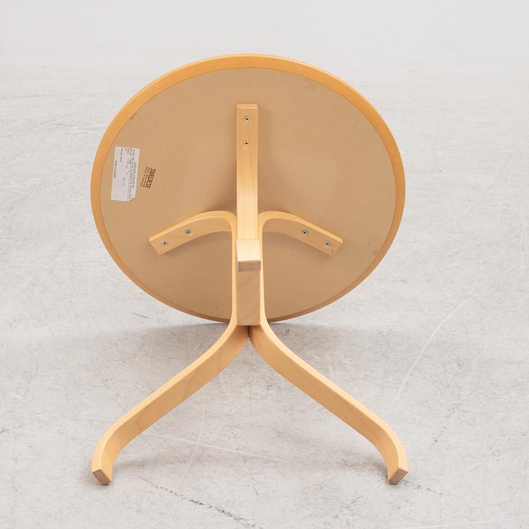 Yngve Ekström, a "Lamino" side table and an "Lamino" ottoman, Swedese, Sweden, 2007.