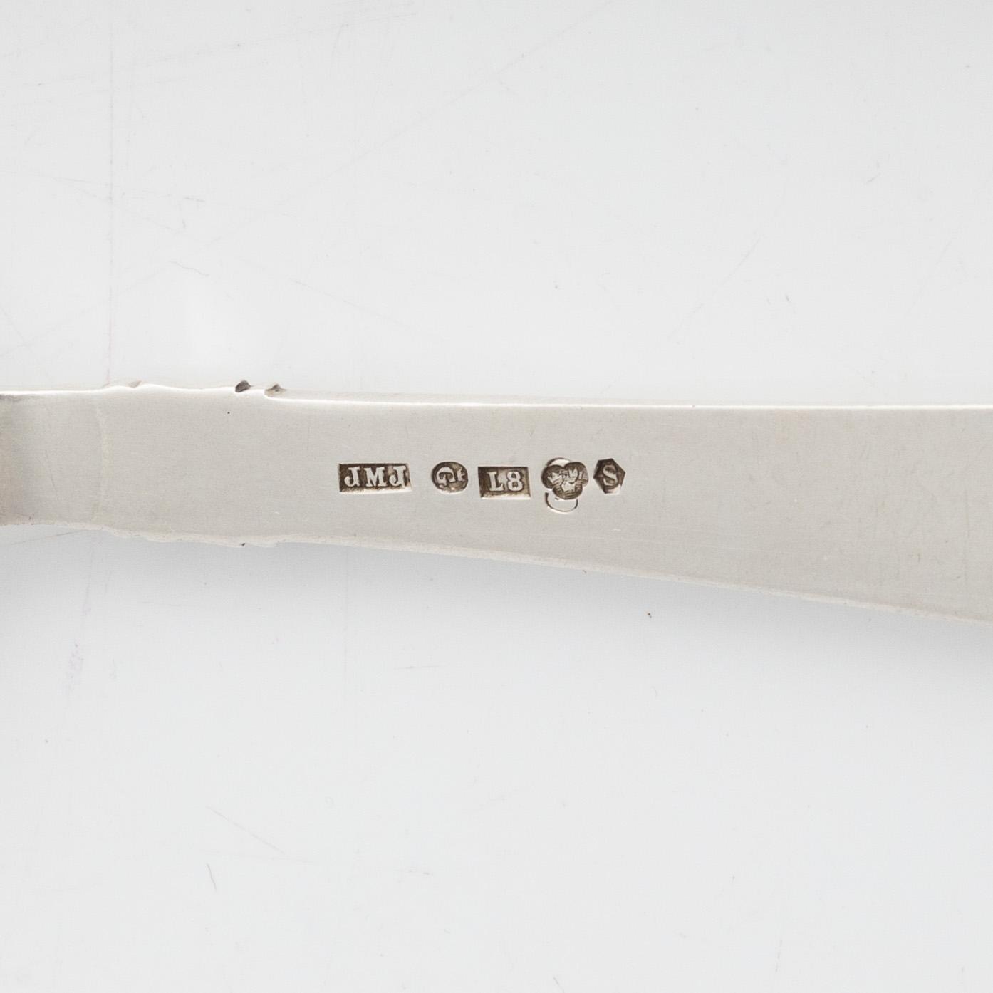 Five silver servers, three with mark of Eric Löfman, MGAB, Lidköping. Two with mark JMJ and Swedish import.