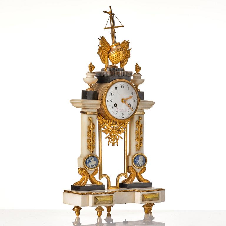 A Louis XVI 18th century mantel clock.