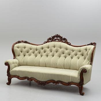 An end of the 19th century rococo style sofa.