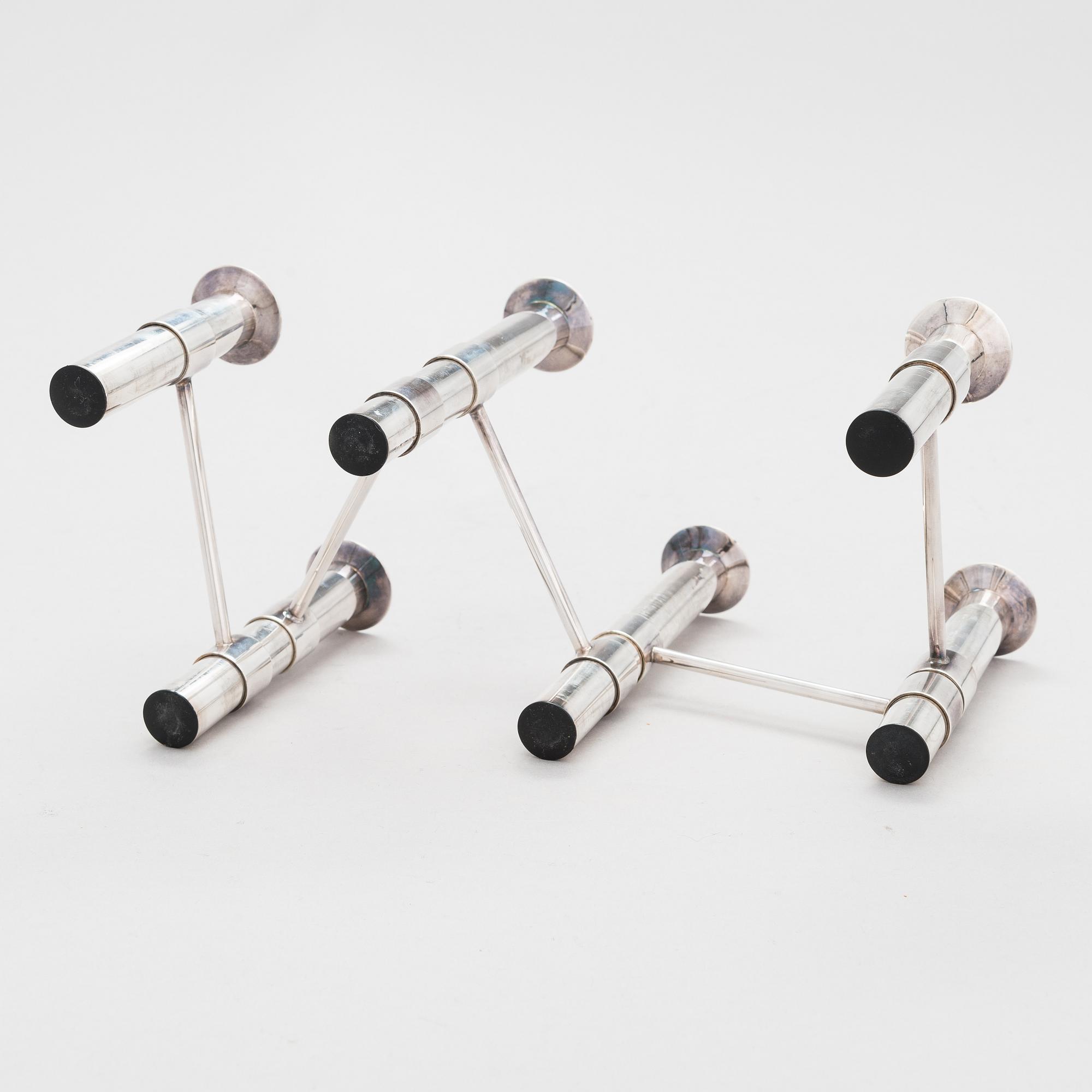 Tapio Wirkkala,  a silver 'Nonstop' candelabrum TW 432, numbered 57/90, Kultakeskus, Hämeenlinna 2007.