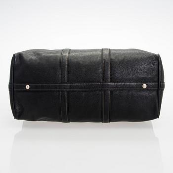 Louis Vuitton, a 'Keepall 50 Taurillon' leather weekend bag.