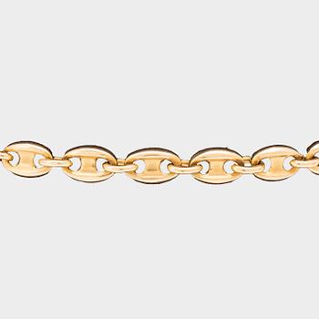 An 18K gold bracelet by Cartier.