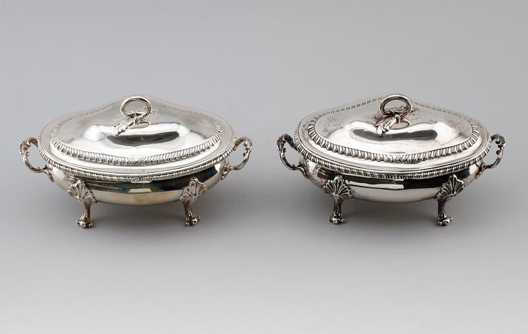 A pair of English 18th century silver sauce-tureens, marks of Sebastian & James Crespell, London 1772.