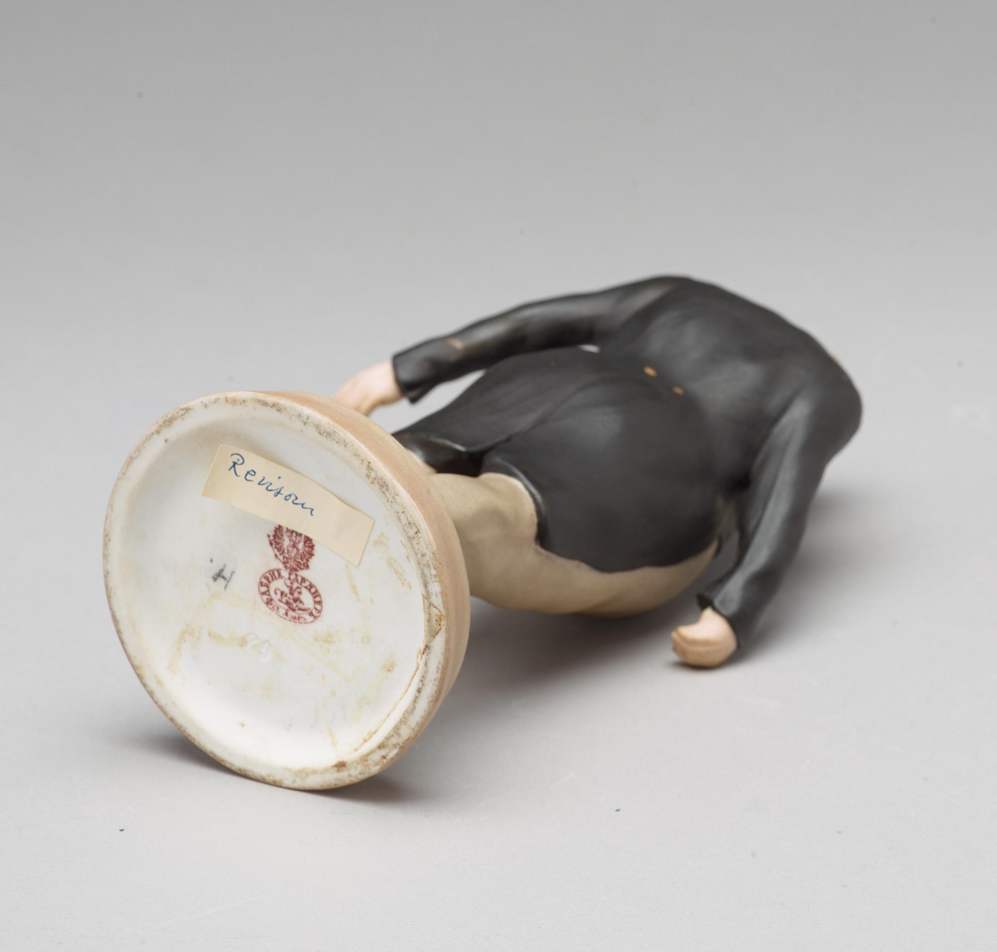 A bisquit porcelain figure of Sobakevich from Gogol's 'Dead Souls', Gardner, Moscow, 1880-1917.
