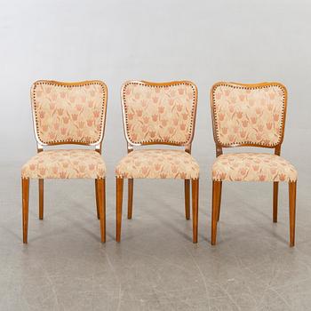 A 1950/60's dining table and chairs.