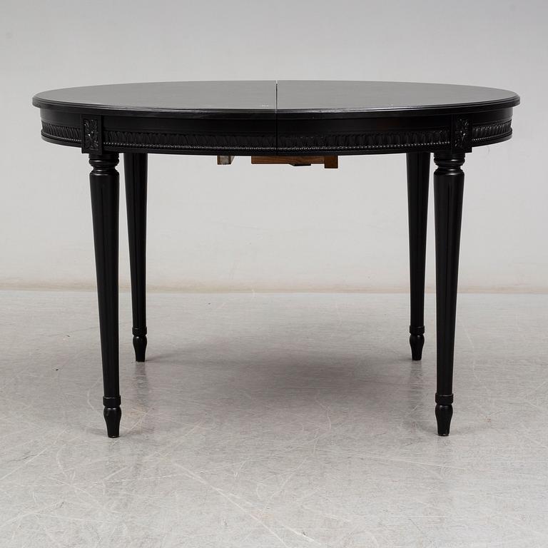 A late 20th Century painted table.