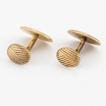 A pair of 14K gold cufflinks, C.E. Bolin, workmaster Ivan Flinck, Moscow 1899-1908.