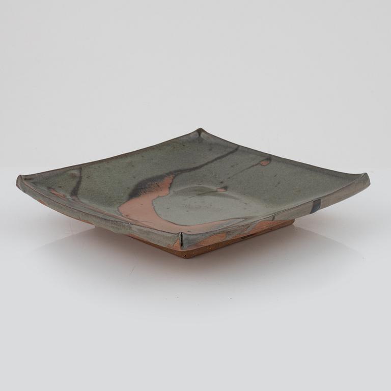 Shoji Hamada, in the manner of, glazed stoneware dish, 20th century.