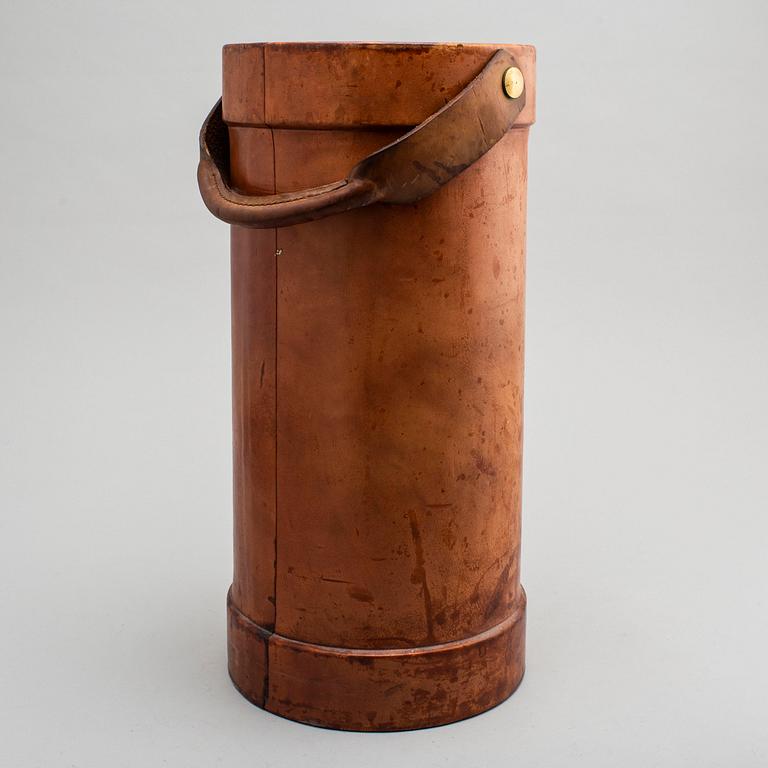 A LEATHER UMBRELLA STAND.