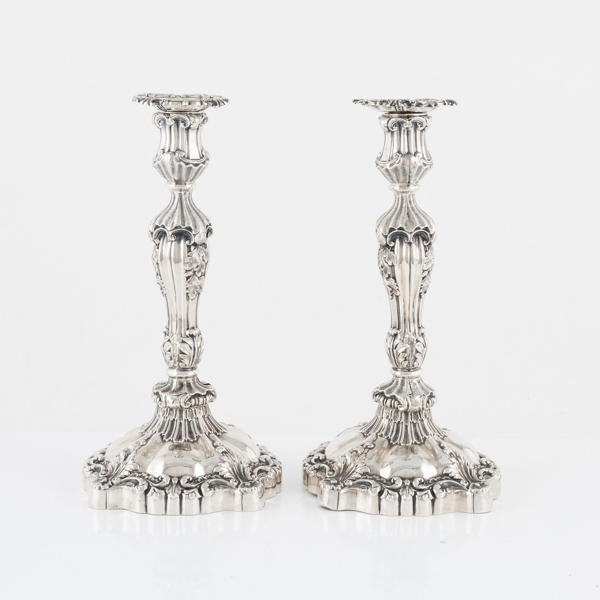 Gustaf Möllenborg, a pair of neo-Rococo silver candlesticks, Stockholm, 1844.