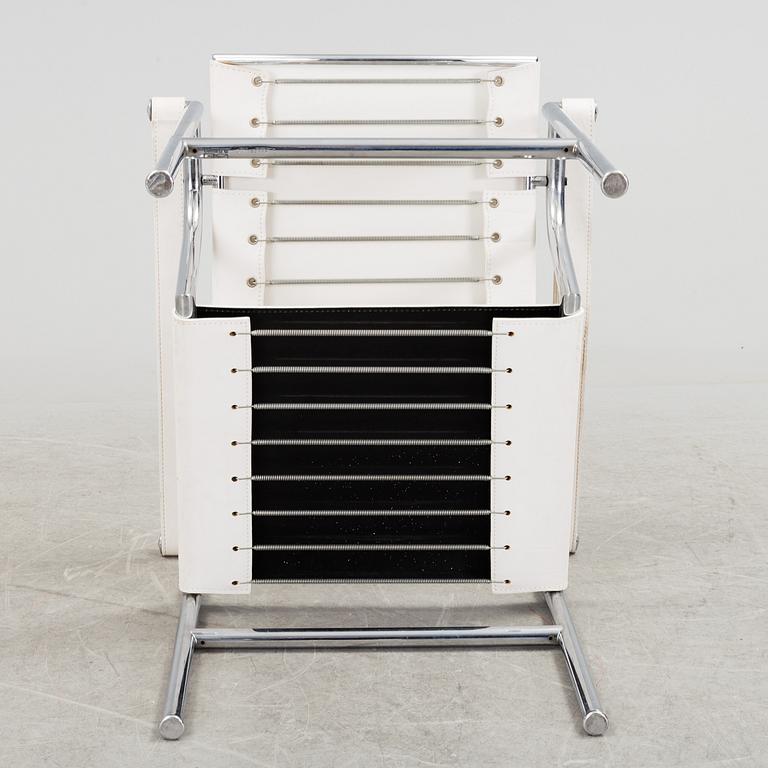 A "LC-1" ARMCHAIR DESIGNED BY LE CORBUSIER FOR CASSINA.