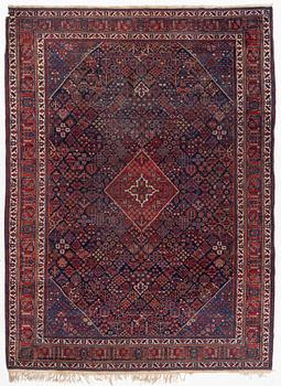 An oriental carpet, c. 360 x 270 cm.