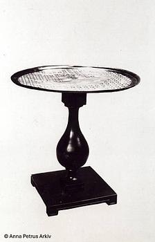 Anna Petrus, a pewter top tray table on a base by Uno Åhrén, executed in her studio, Stockholm, ca 1922-25.