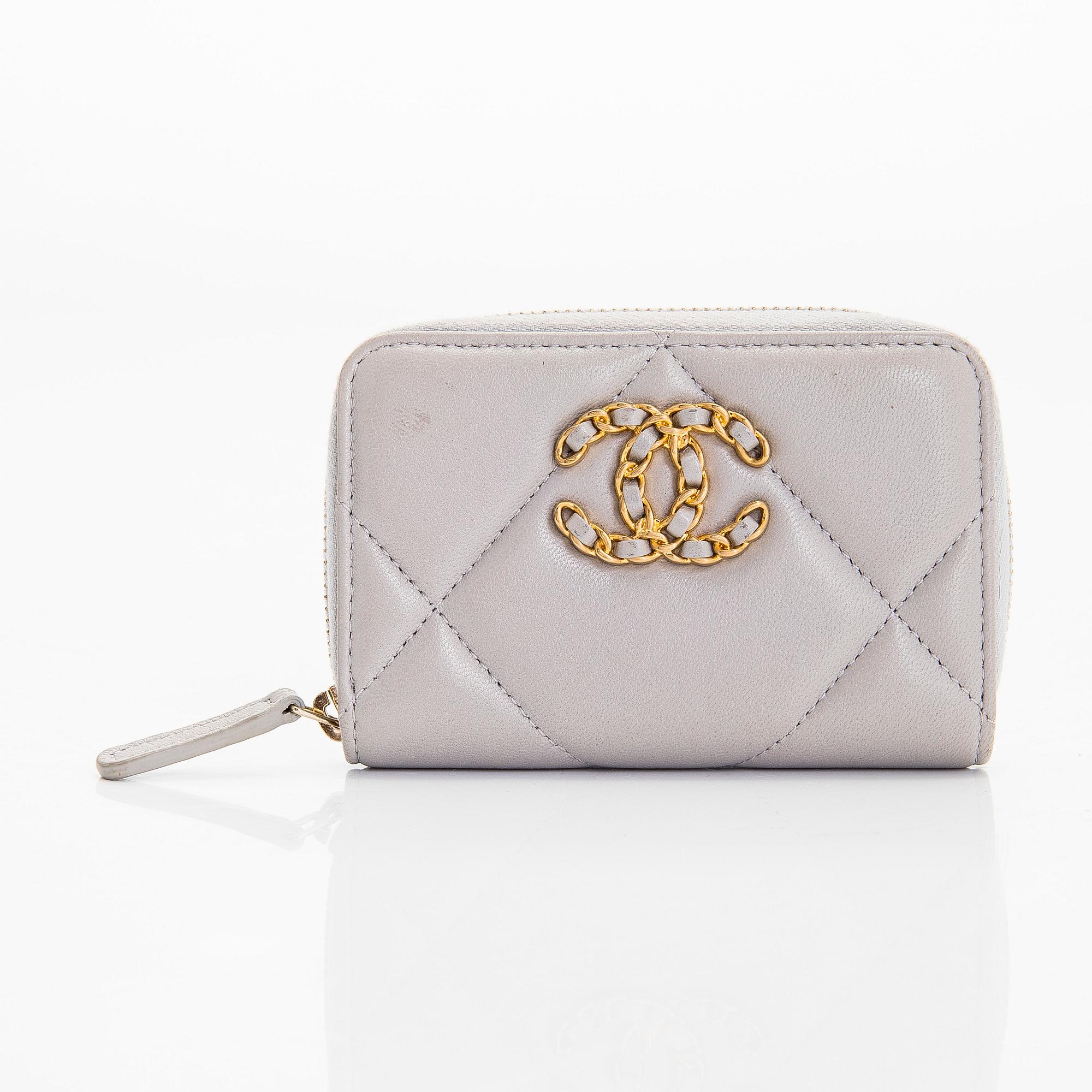 Chanel, A "19 O-coin purse" wallet.