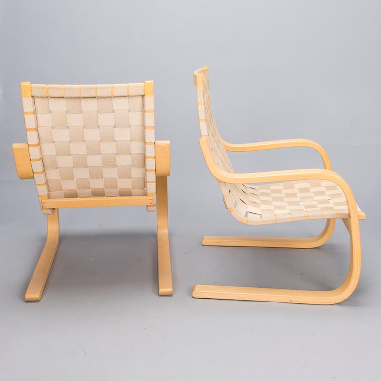 ALVAR AALTO, Pair of model '406' armchairs for Artek, late 20th century .