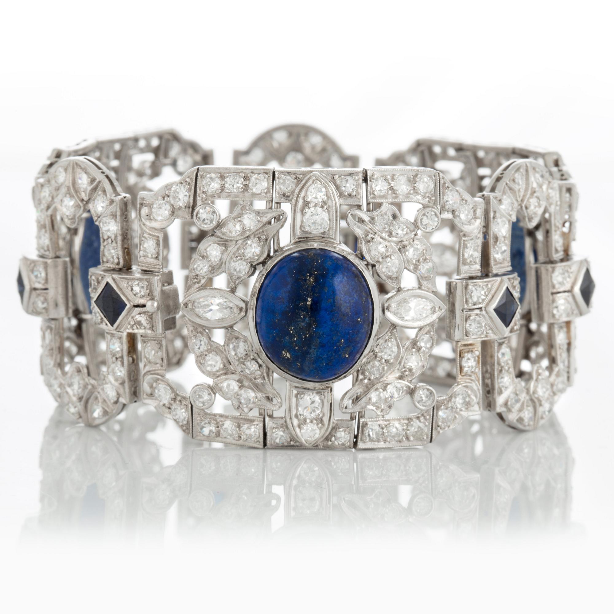 A platinum bracelet set with lapis lazuli, old-cut diamonds with a total weight of ca 10 cts and synthetic sapphires.