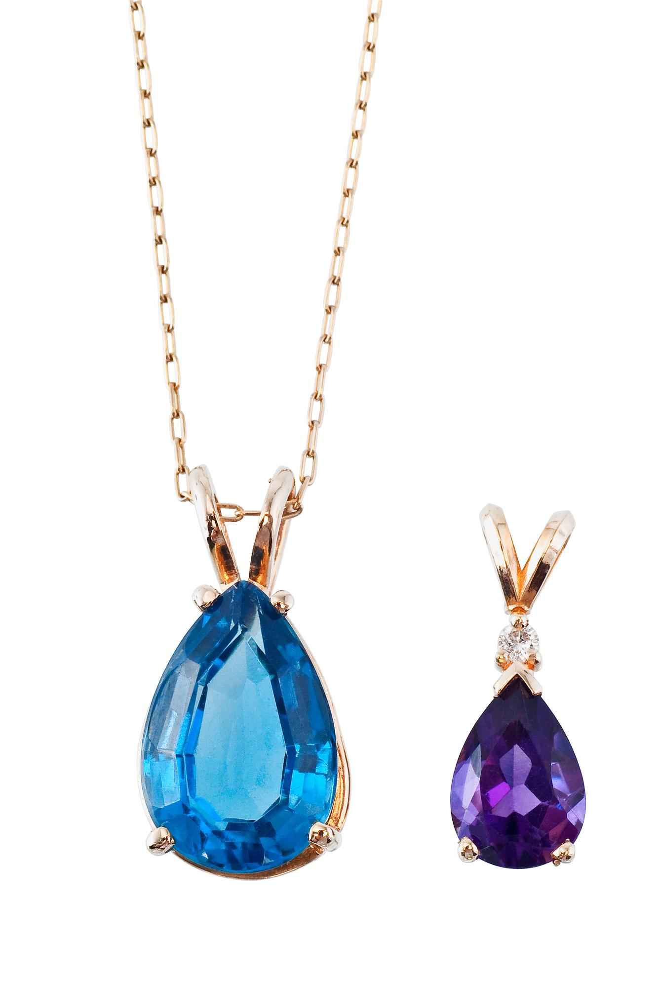 A NECKLACE WITH AMETHYST AND TOPAZ PENDANTS.