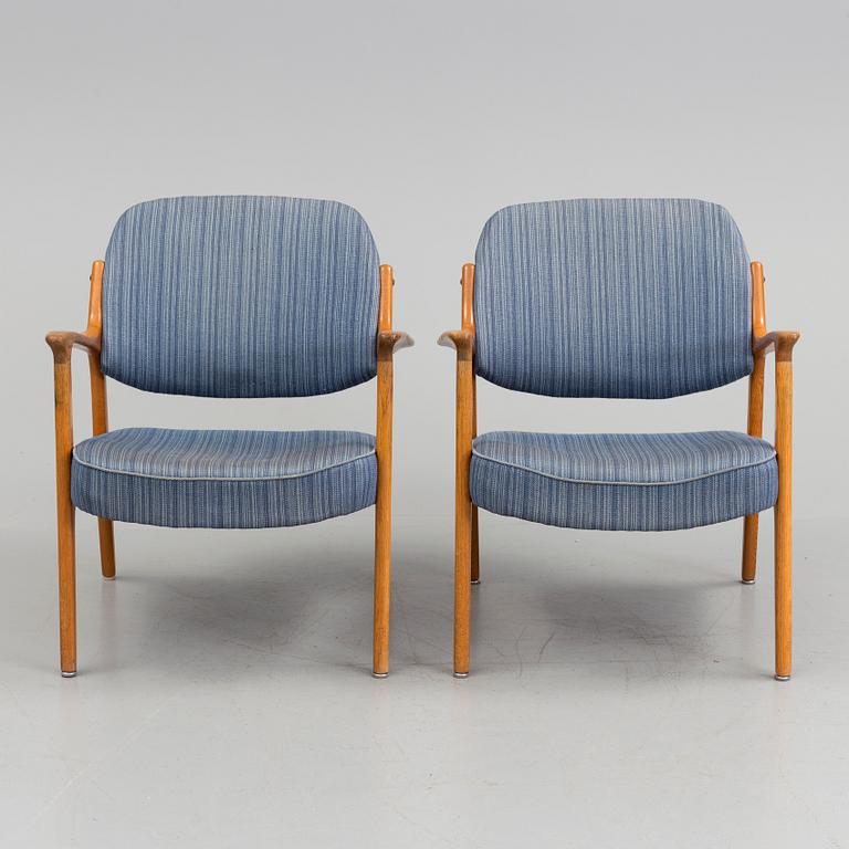 A pair of oak armchairs from Bröderna Andersson, mid 20th Century.