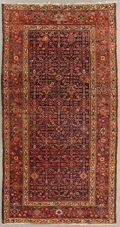 A semiantique Malajir carpet ca 296 x 168 cm.