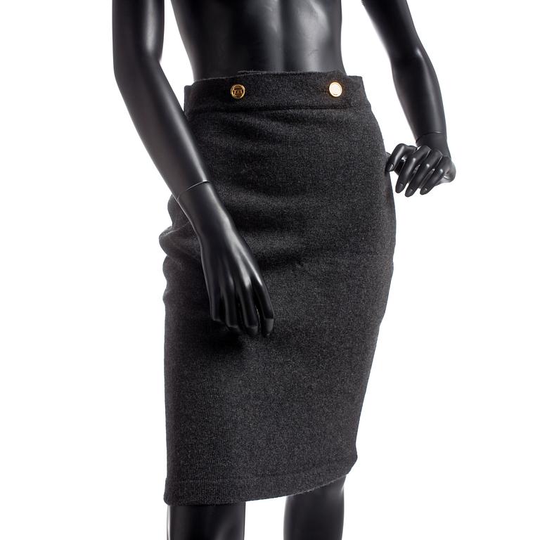 CHANEL, a grey cashmere jacket and skirt.