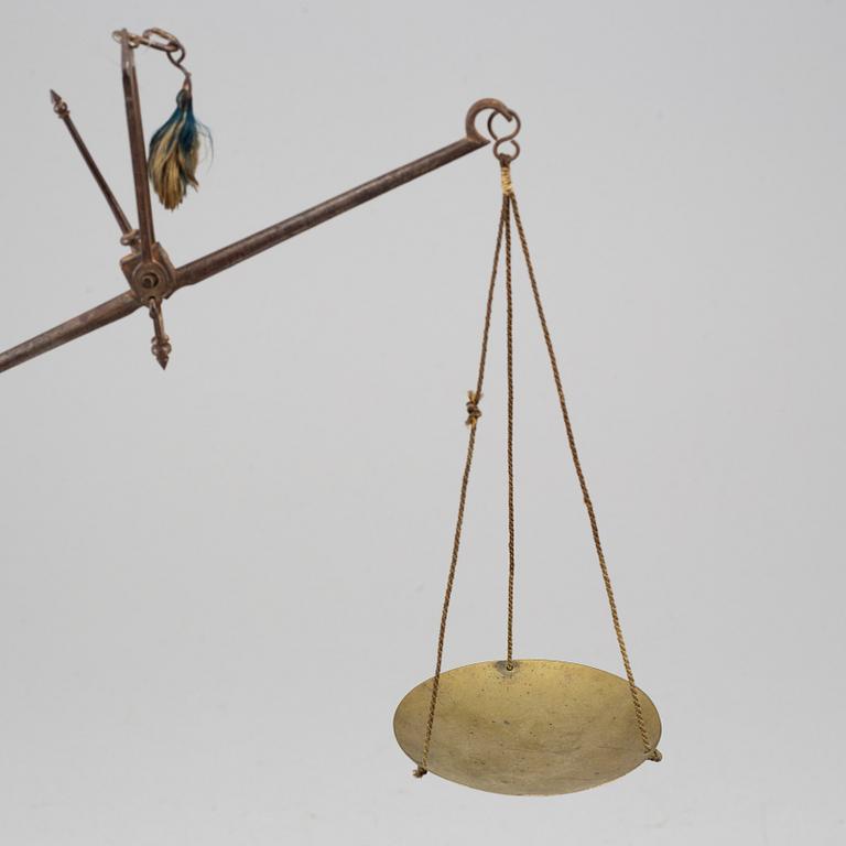 An iron and brass set of gold scales, 18th century.