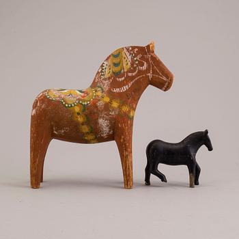 Two swedish wooden horses from the 20th century.