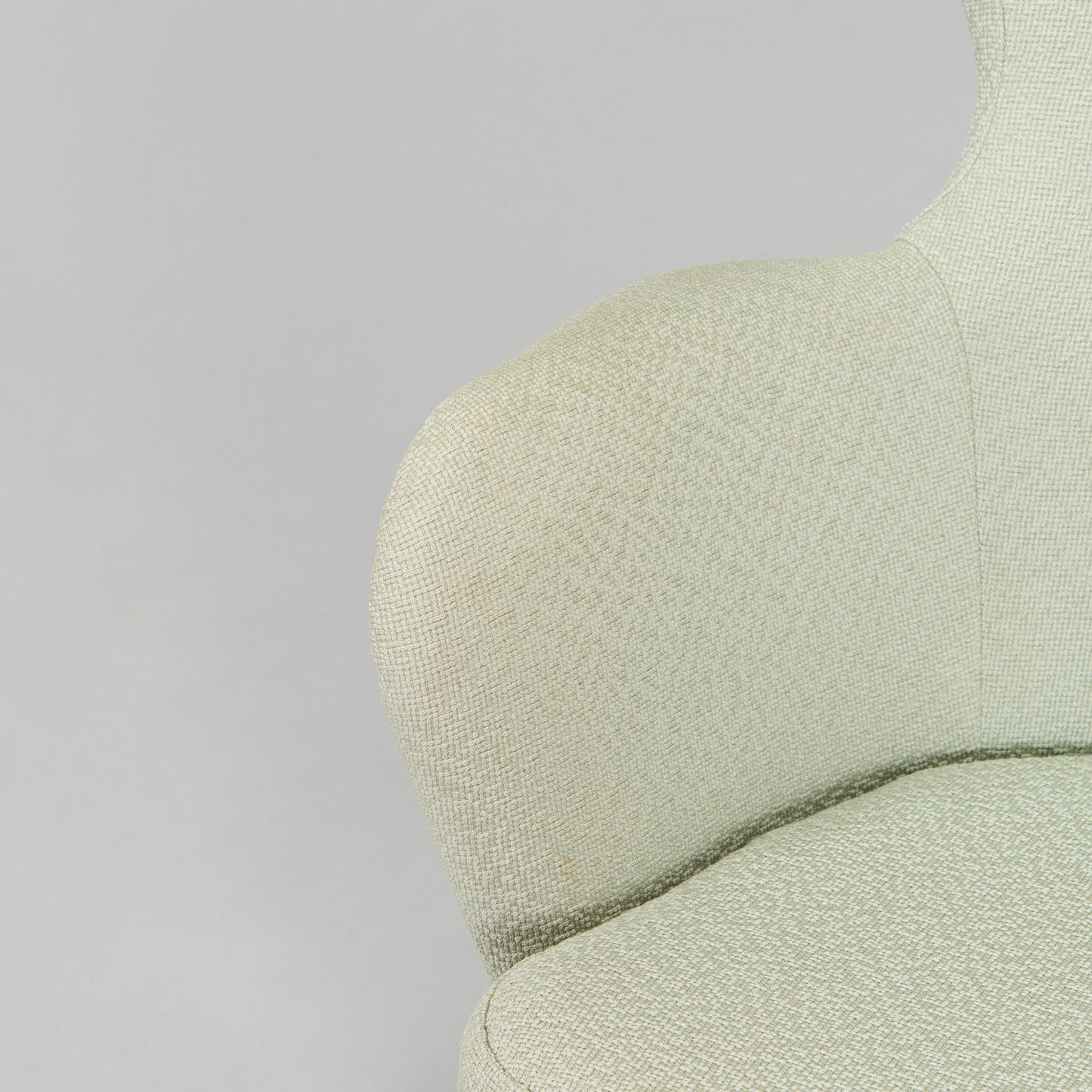 Carl Gustaf Hiort af Ornäs, A mid-20th-century armchair 'Siesta' manufacturer Puunveisto Oy - Träsnideri Ab, Finland.