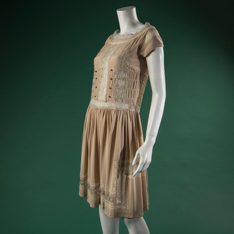 A dress by BOTTEGA VENETA, in size 40(IT).