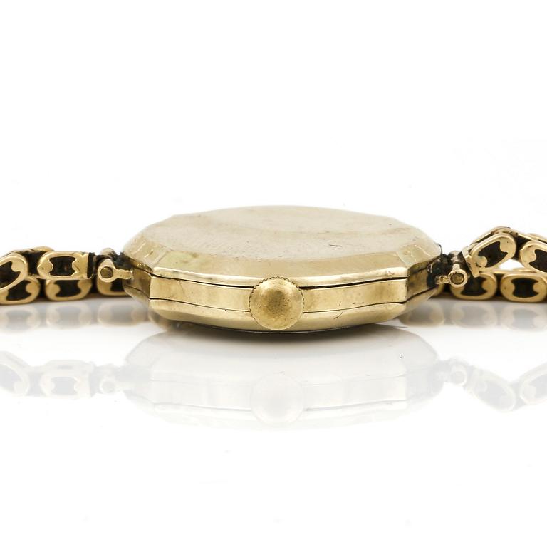 DAMARMBANDSUR, manuell, 14K guld med länk i 18K guld. total vikt ca 19g.