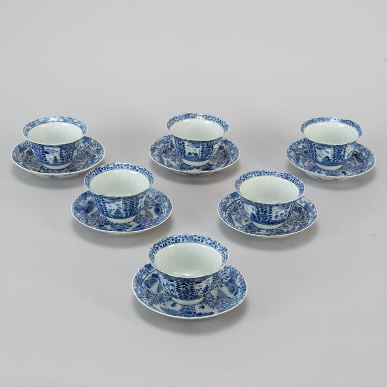 Six Chinese blue and white cups with dishes, early 20th century.